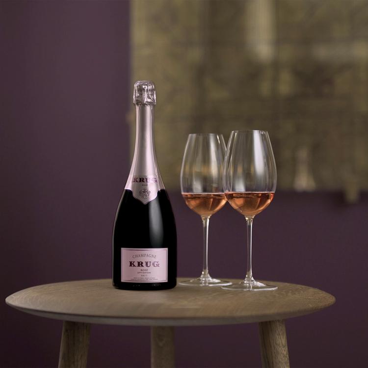 A bottle of Krug Rosé with two glasses
